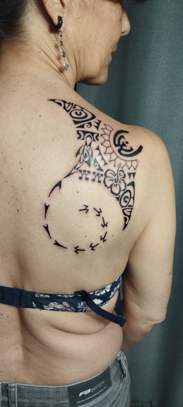 Aida - Uanana manta tattoo photo