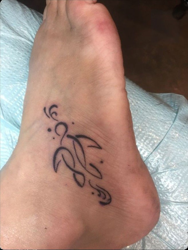 Guest - NK turtle tattoo