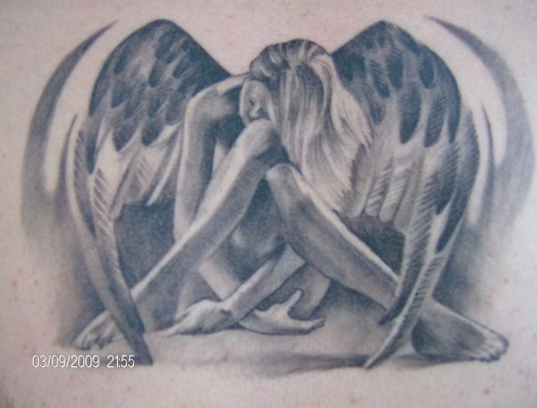 Tom - Weeping angel tattoo